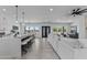 Open concept living space with large island, dining area, and comfortable seating at 300 S Charleston Ct, Casa Grande, AZ 85194