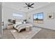 Serene bedroom with carpet, stylish bedside tables and a large window offering natural light and views at 300 S Charleston Ct, Casa Grande, AZ 85194