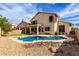 Exterior view of home with a pool, patio, and desert landscaping at 3132 E Wildwood Dr, Phoenix, AZ 85048