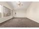 Bedroom featuring carpeted floors and lots of natural light at 3132 E Wildwood Dr, Phoenix, AZ 85048