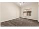Inviting bedroom with natural light and neutral color scheme, perfect for relaxation and personalization at 3132 E Wildwood Dr, Phoenix, AZ 85048