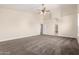 Spacious main bedroom with a ceiling fan and neutral color palette for a calming atmosphere at 3132 E Wildwood Dr, Phoenix, AZ 85048
