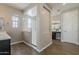 Bathroom featuring a glass-enclosed shower, wood-look tile floors and double vanity at 3310 E Los Gatos Dr, Phoenix, AZ 85050