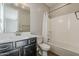 Well-maintained bathroom with a shower-tub combo, modern vanity, and stylish fixtures for a refreshing experience at 3310 E Los Gatos Dr, Phoenix, AZ 85050