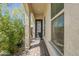 Inviting covered entryway with a decorative front door and tiled flooring at 3310 E Los Gatos Dr, Phoenix, AZ 85050