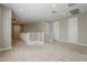 Open loft space with carpeting and multiple entry doors to other rooms on the second story at 3310 E Los Gatos Dr, Phoenix, AZ 85050