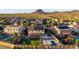 Aerial view of the community surrounded by desert landscaping and mountain views at 3715 W Teresa Dr, New River, AZ 85087