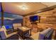 Inviting covered patio with comfortable seating and a fireplace for cozy evenings at 3715 W Teresa Dr, New River, AZ 85087