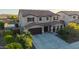 Charming two-story home with a three-car garage, tile roof, and well-maintained landscaping at 3715 W Teresa Dr, New River, AZ 85087