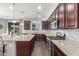 Modern kitchen featuring granite countertops, stainless steel appliances, and ample cabinet space at 3715 W Teresa Dr, New River, AZ 85087