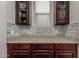 Beautiful counter space with dark cabinetry and sleek mosaic backsplash for a luxurious feel at 3715 W Teresa Dr, New River, AZ 85087