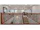Loft featuring neutral carpets, recessed lighting, ornate stair rails and views to other rooms at 3715 W Teresa Dr, New River, AZ 85087