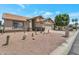 Charming single story home with desert landscaping and a two-car garage at 3755 N 151St Ave, Goodyear, AZ 85395