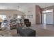 Spacious living room showcases an open layout, seamlessly connecting to the kitchen at 3755 N 151St Ave, Goodyear, AZ 85395
