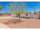 Exterior view of the single-story home featuring low maintenance desert landscaping at 39 N Maple St, Mesa, AZ 85205
