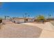 Single-story home featuring low maintenance desert landscaping, a spacious gravel yard, and driveway at 39 N Maple St, Mesa, AZ 85205