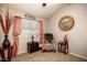 Charming room with a comfy chair, decorative accents, and plenty of natural light at 4083 E Rustler Way, Gilbert, AZ 85297