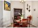 Bright dining room with neutral decor, a decorative hutch and seating for four at 4083 E Rustler Way, Gilbert, AZ 85297