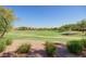 A picturesque view of the lush green golf course, providing serene scenery and leisure opportunities at 4083 E Rustler Way, Gilbert, AZ 85297