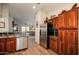 Modern kitchen features stainless steel appliances, sleek granite counters, and ample storage at 4083 E Rustler Way, Gilbert, AZ 85297