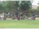 Community playground with slides and covered picnic area at 4083 E Rustler Way, Gilbert, AZ 85297