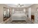 Spacious bedroom featuring neutral tones, and a large bed at 410 E Beck Ln, Phoenix, AZ 85022