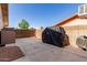 Spacious side yard featuring a concrete patio, secure fencing, and ample storage for outdoor equipment at 410 E Beck Ln, Phoenix, AZ 85022