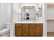 Bathroom with a vanity and generous counter space, featuring a view to the bedroom at 4213 W Calle Lejos --, Glendale, AZ 85310