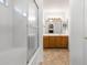 Clean bathroom with a shower and vanity, designed for relaxation and functionality at 4213 W Calle Lejos --, Glendale, AZ 85310
