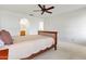 Bright bedroom with neutral tones, showcasing a comfortable bed and ample natural light at 4213 W Calle Lejos --, Glendale, AZ 85310