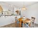 Charming dining nook overlooking the kitchen, ideal for Gathering meals and casual entertaining at 4213 W Calle Lejos --, Glendale, AZ 85310