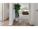 Warm and inviting entryway with tiled floors that leads to the living room at 4213 W Calle Lejos --, Glendale, AZ 85310