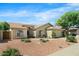 Charming single-Gathering home with a well-manicured yard, arched windows, and a two-car garage at 4213 W Calle Lejos --, Glendale, AZ 85310