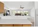 Bright, open kitchen overlooking the living room area, perfect for modern living and entertaining at 4213 W Calle Lejos --, Glendale, AZ 85310