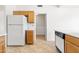 Functional kitchen with white appliances, and sleek countertops for easy meal preparation and cleanup at 4213 W Calle Lejos --, Glendale, AZ 85310