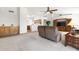 Bright, open-concept living room flows into the kitchen with modern finishes and plenty of natural light at 4213 W Calle Lejos --, Glendale, AZ 85310