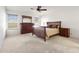 Spacious main bedroom with carpet, ceiling fan, and natural light at 4213 W Calle Lejos --, Glendale, AZ 85310