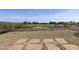 Desert backyard featuring a rock ground cover and a low wall to enjoy the desert and green golf course at 4316 E Strawberry Dr, Gilbert, AZ 85298