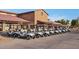 Row of parked golf carts at the golf course clubhouse at 4316 E Strawberry Dr, Gilbert, AZ 85298