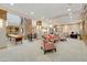 Comfortable lobby seating area with a game room and the community office at 4316 E Strawberry Dr, Gilbert, AZ 85298