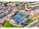 Aerial view of well-maintained tennis courts and surrounding community amenities in a vibrant setting at 4316 E Strawberry Dr, Gilbert, AZ 85298