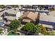 Aerial view of home with lush backyard landscaping, a pool, and mature trees at 43330 W Delia Blvd, Maricopa, AZ 85138