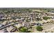 Aerial view of residential community with homes, pools, and green spaces at 43330 W Delia Blvd, Maricopa, AZ 85138
