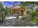 Cozy backyard with covered patio, seating area, and desert landscaping at 43330 W Delia Blvd, Maricopa, AZ 85138