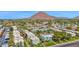 Stunning aerial view of the community with lush landscaping and a mountain backdrop in Scottsdale, Arizona at 4600 N 68Th St # 370, Scottsdale, AZ 85251