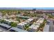 Extensive aerial view of residential housing with mature palm trees in Scottsdale, Arizona at 4600 N 68Th St # 370, Scottsdale, AZ 85251