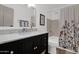 Bathroom with modern vanity, marble countertop, and shower-tub combination at 4600 N 68Th St # 370, Scottsdale, AZ 85251