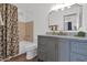 Updated bathroom with a gray vanity, marble countertop, and shower-tub combination at 4600 N 68Th St # 370, Scottsdale, AZ 85251