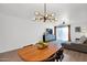 Dining room featuring modern lighting, dining table, and open concept living at 4600 N 68Th St # 370, Scottsdale, AZ 85251