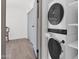 Convenient laundry area features a stacked washer and dryer and a neutral color palette at 4600 N 68Th St # 370, Scottsdale, AZ 85251
